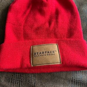 Striking Red Knit Beanie with Patch